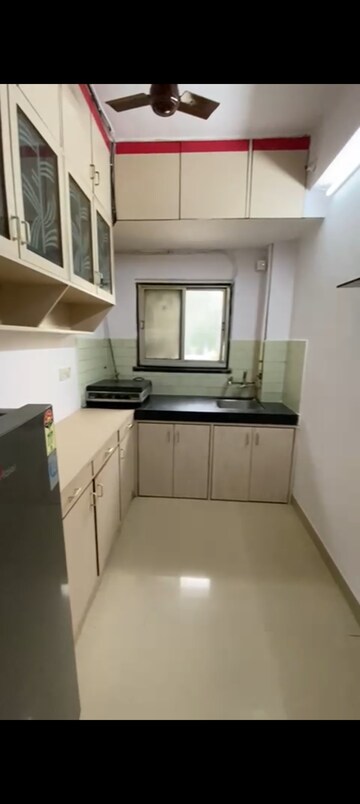 Kitchen in 2 BHK Apartment at Anushka CHS, Andheri West – for Rent