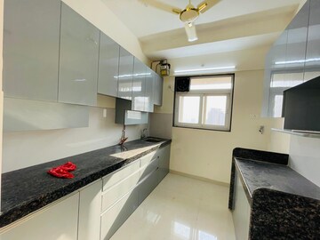 Kitchen in 2 BHK Apartment at Ashar Axis, Majiwada – for Rent