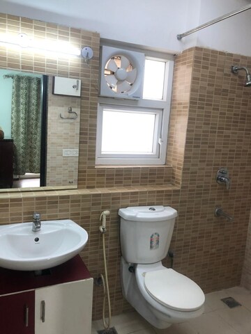 Bathroom in 2 BHK Apartment at Antriksh Golf View, Sector 78 – for Rent