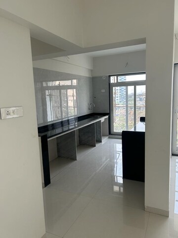 Kitchen in 1 BHK Apartment at Millennium Flora, New Panvel Sector 17 – for Sale