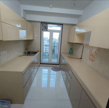 Kitchen in 2 BHK Apartment at Sheth Avalon Phase 2, Majiwada – for Rent