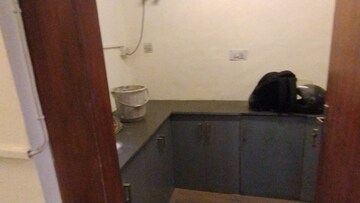 Kitchen in 6 BHK Apartment at Safdarjang Enclave – for Sale