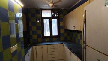 Kitchen in 6 BHK Apartment at Safdarjang Enclave – for Sale