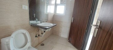 Bathroom in 4 BHK Apartment at Apex Athena, Sector 75 – for Sale