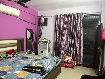 Bedroom in 3 BHK Builder Floor at Dhakoli Village – for Sale