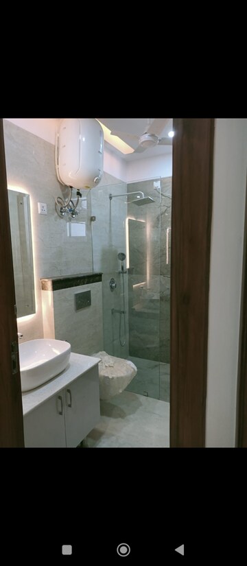 Bathroom in 4 BHK Builder Floor at Palam Vihar Residents Association, Palam Vihar – for Rent