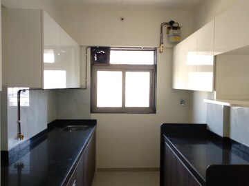 Kitchen in 3 BHK Apartment at Lashkaria Green Height, Jogeshwari West – for Rent