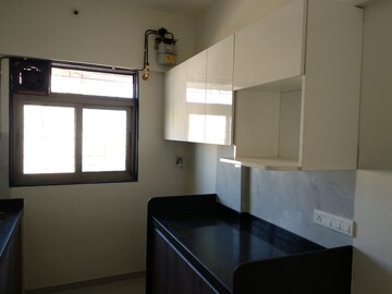 Kitchen in 3 BHK Apartment at Lashkaria Green Height, Jogeshwari West – for Rent