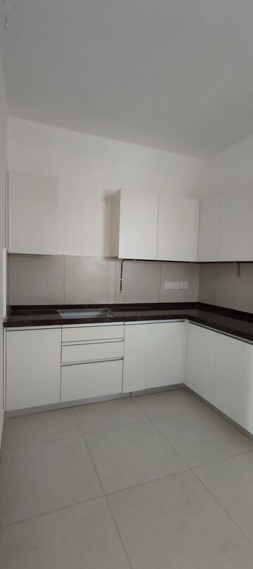 Kitchen in 2 BHK Apartment at Marvel Fria, Wagholi – for Sale