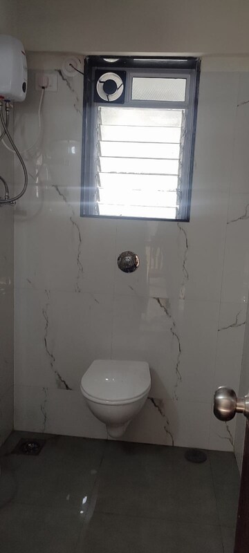 Bathroom in 2 BHK Apartment at Neelyog Towers, Malad East – for Rent