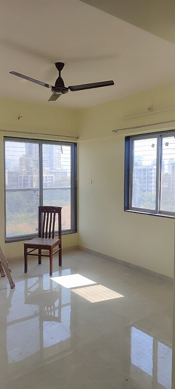 Living Room in 2 BHK Apartment at Neelyog Towers, Malad East – for Rent