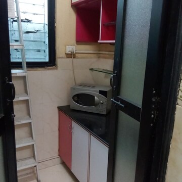 Kitchen in 1 BHK Apartment at Raheja Heights Phase 2, Goregaon East – for Rent