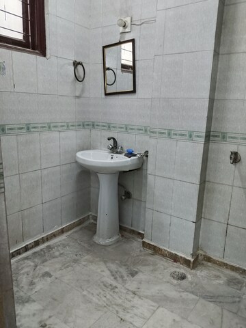 Bathroom in 2 BHK Apartment at Khirki Extension – for Rent