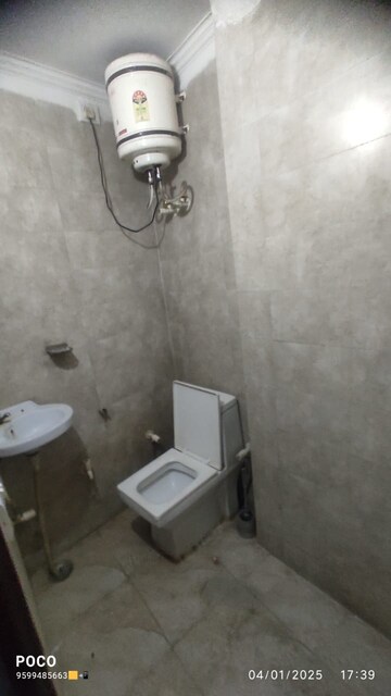 Bathroom in 2 BHK Builder Floor at Mehrauli – for Rent