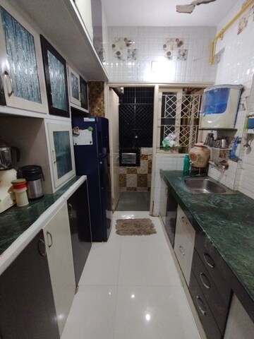 Kitchen in 2 BHK Apartment at Jivrajpark – for Sale