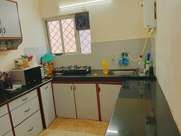 Kitchen in 2.5 BHK Apartment at Kolte Patil Green Acre, Salunkhe Vihar Society – for Sale
