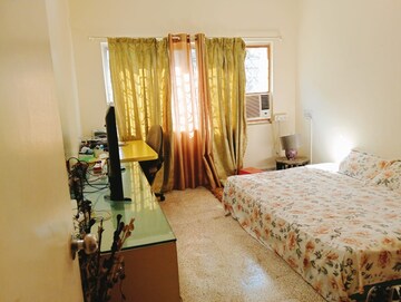 Bedroom in 2.5 BHK Apartment at Kolte Patil Green Acre, Salunkhe Vihar Society – for Sale