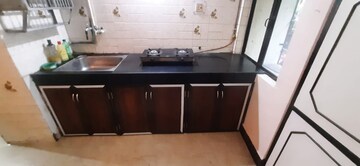 Kitchen in 1 BHK Apartment at Vasant Vihar Society, Manpada – for Sale