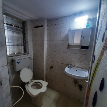 Bathroom in 1 BHK Apartment at Dheeraj Uphar CHS. LTD., Malad East – for Rent