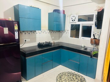 Kitchen in 2 BHK Apartment at Signature Global Orchard Avenue, Sector 93 – for Sale
