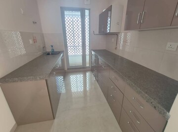 Kitchen in 2 BHK Apartment at Piramal Vaikunth, Balkum Pada – for Rent