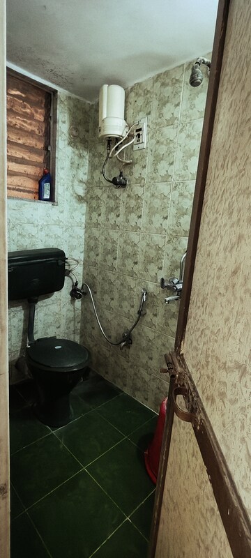 Bathroom in 2 BHK Apartment at Dahisar West – for Sale