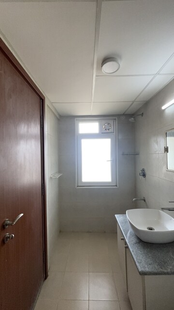 Bathroom in 3 BHK Apartment at Bhartiya Nikoo Homes Phase 2, Thanisandra Main Road – for Sale