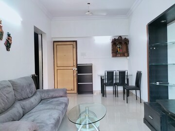 Living Room in 1 BHK Apartment at K Raheja Heights, Malad East – for Rent