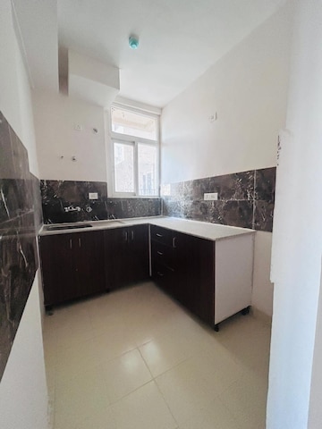 Kitchen in 3 BHK Apartment at Amrapali Leisure Park, Amrapali Leisure Valley – for Sale