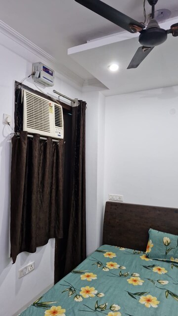 Bedroom in 1 RK Builder Floor at Ansal Sushant Lok I, Sector 43 – for Rent