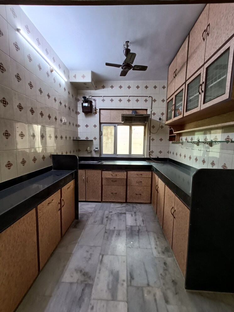 Kitchen, satellite-garden 2 Bedroom 875 Sq.Ft. Apartment In Goregaon East Mumbai 8042403