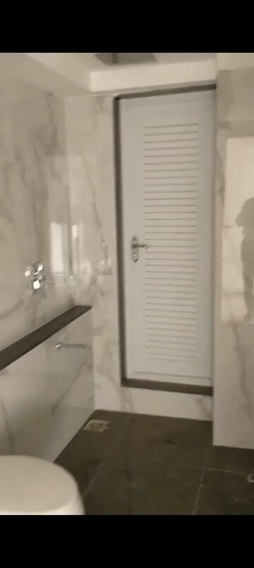Bathroom in 2 BHK Apartment at Ruparel Ariana, Parel – for Rent