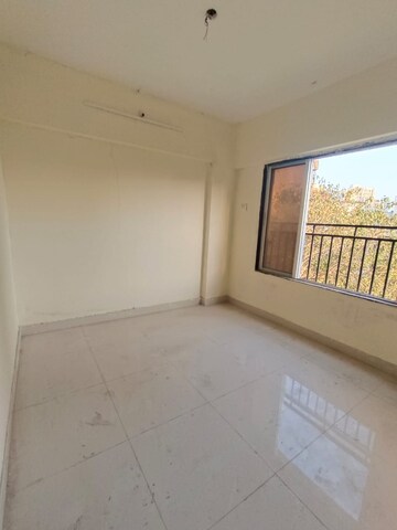 Room in 2 BHK Apartment at Romell Asrava, Andheri West – for Sale