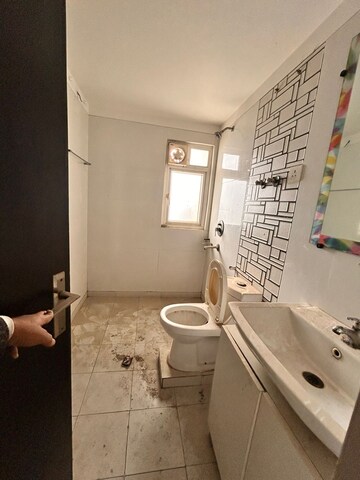Bathroom in 4 BHK Apartment at Gulshan Vivante, Sector 137 – for Sale