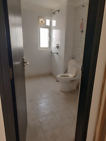 Bathroom in 4 BHK Apartment at Gulshan Vivante, Sector 137 – for Sale