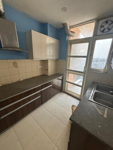 Kitchen in 4 BHK Apartment at Ansal Celebrity Meadows, Sushant Golf City – for Rent