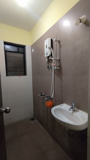 Bathroom in 1 BHK Apartment at Raunak City, Kalyan West – for Rent