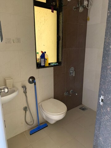 Bathroom in 1 BHK Apartment at Raunak Unnathi Woods Phase 7 A And B, Ghodbunder Road – for Rent