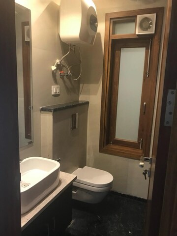 Bathroom in 3 BHK Apartment at Defence Colony – for Rent