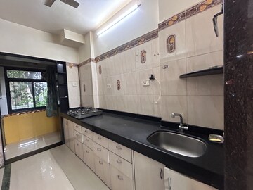 Kitchen in 2 BHK Apartment at Suncity Complex, Powai – for Sale