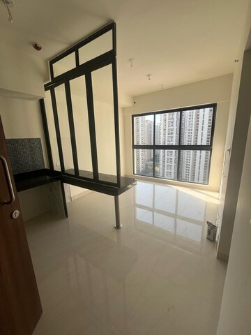 Living Room in 1 BHK Apartment at Lodha Quality Home Tower 5, Majiwada – for Rent