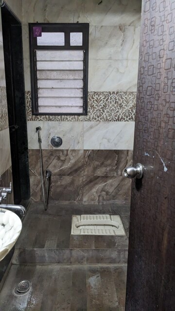 Bathroom in 2 BHK Apartment at Puranik City, Kasarvadavali – for Rent