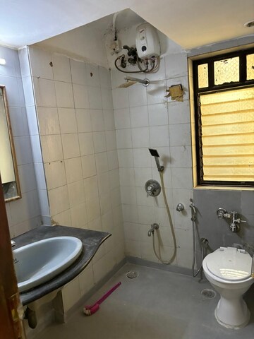 Bathroom in 3 BHK Apartment at Andheri West – for Rent
