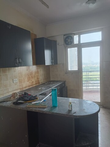 Kitchen in 2 BHK Apartment at Amrapali Silicon City, Sector 76 – for Sale