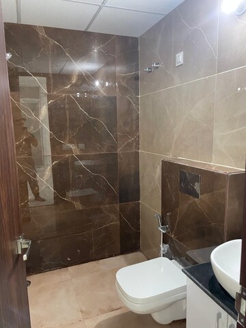 Bathroom in 3 BHK Apartment at Golden Sand Apartments, Dhakoli Village – for Rent