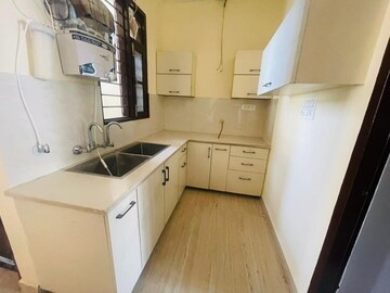 Kitchen in 1 BHK Apartment at Paradigm Business Hermitage Park, Dhakoli Village – for Rent