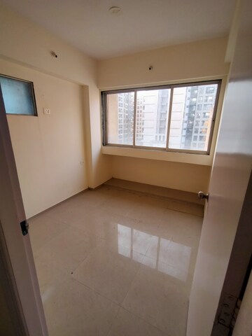 Master Bedroom in 1.5 BHK Apartment at Laxmi Avenue D Global City Ph-1, Virar West – for Sale