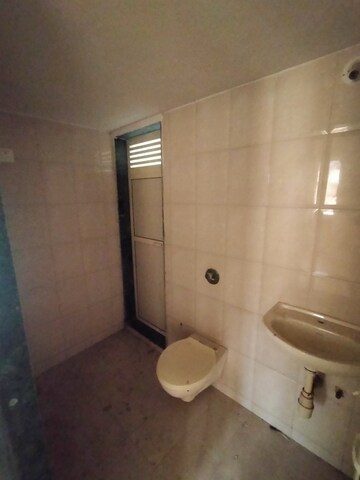 Bathroom in 1.5 BHK Apartment at Laxmi Avenue D Global City Ph-1, Virar West – for Sale
