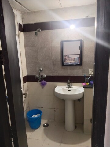 Bathroom in 1 BHK Apartment at Aditya Celebrity Homes, Sector 76 – for Sale