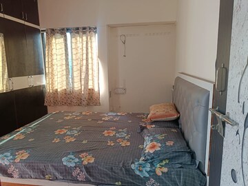 Bedroom in 2 BHK Apartment at Krishnakunj CHS Wagholi, Wagholi – for Rent